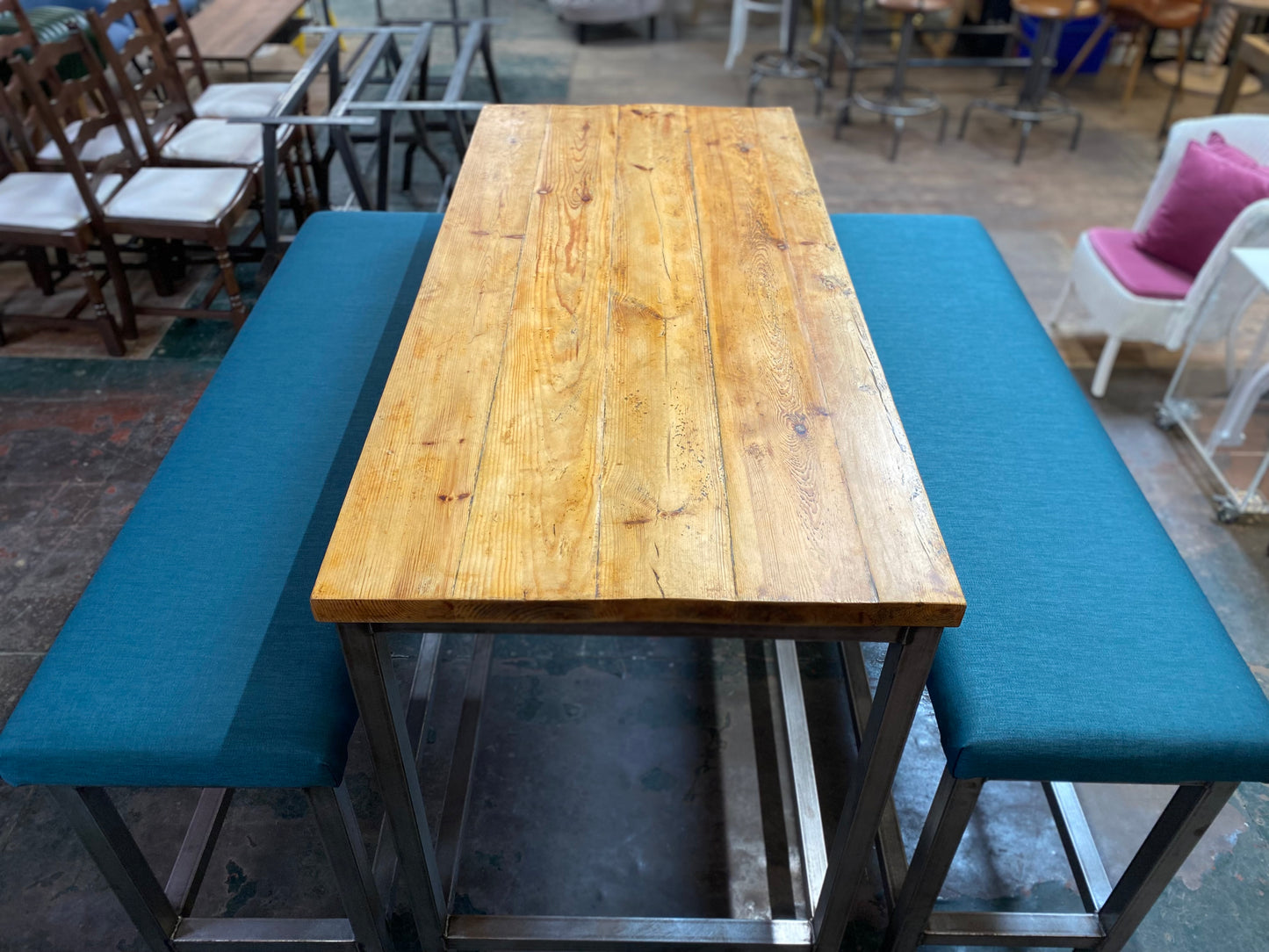 Industrial metal framed poseur table and benches