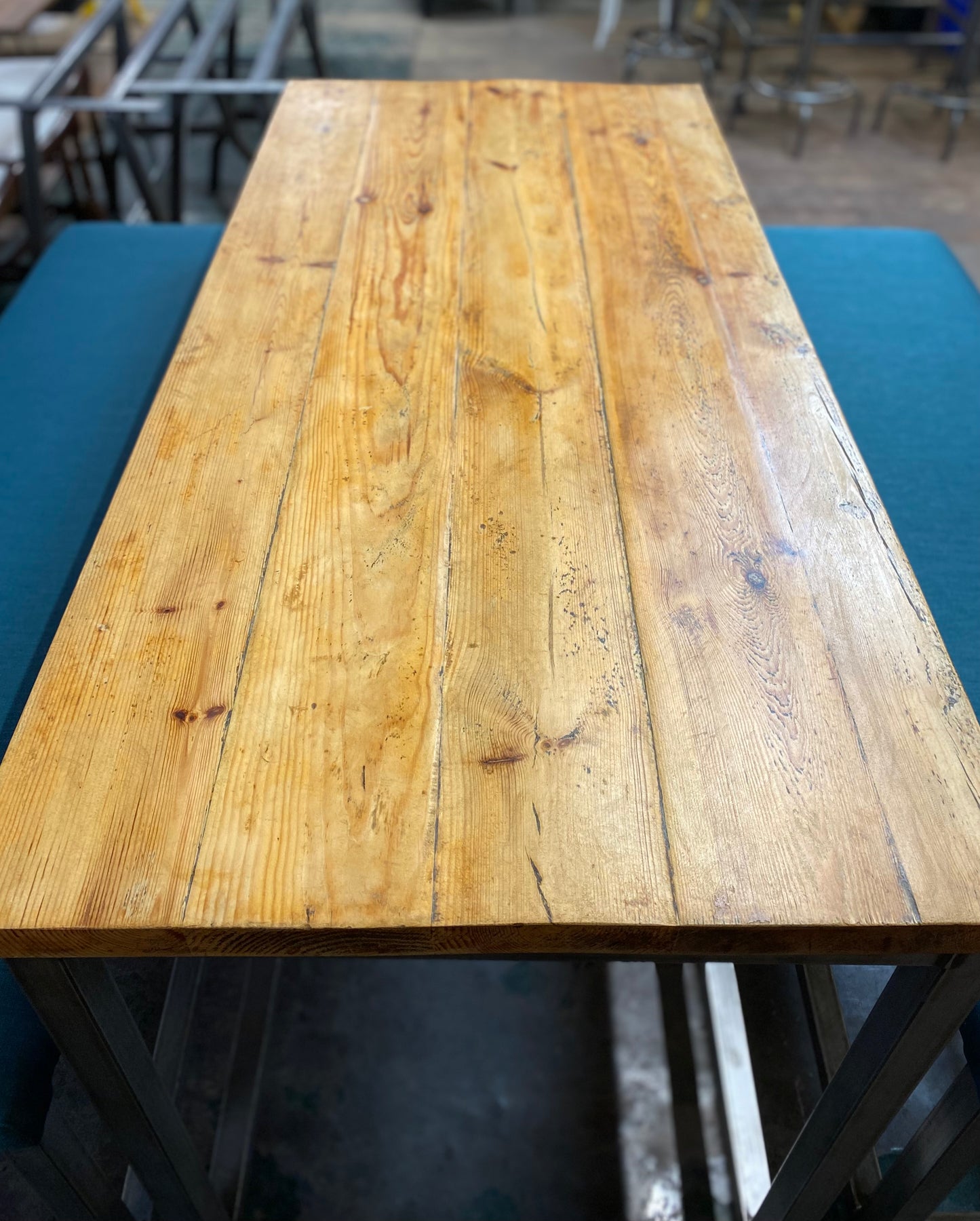 Industrial metal framed poseur table and benches