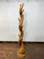 Tree trunk coat stand