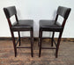 Pair of Black Faux Leather Bar Stools with Wood Frames