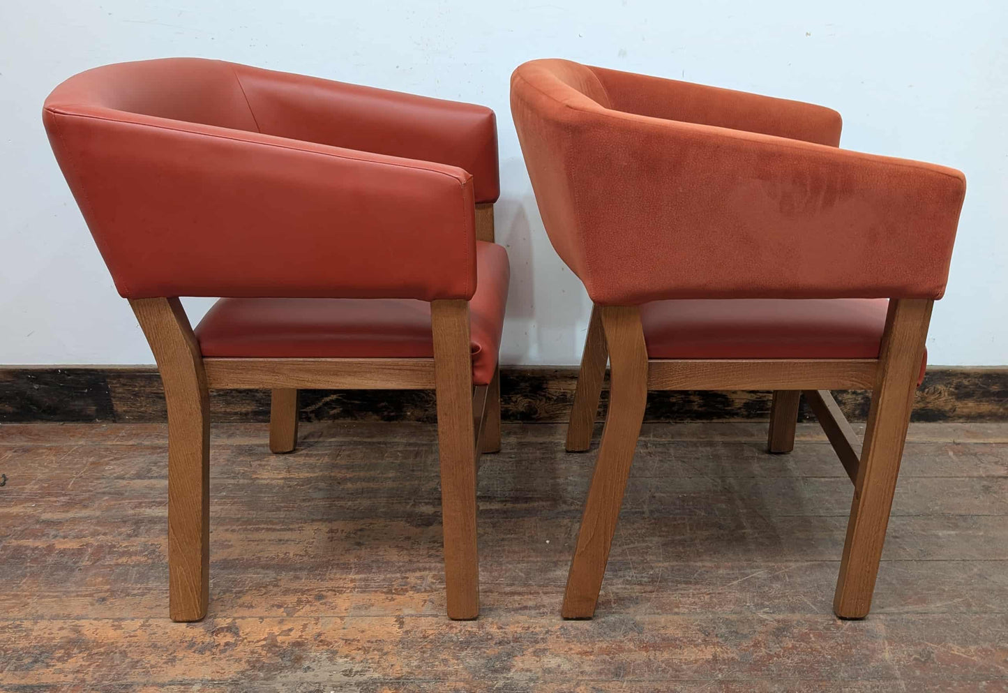 Set of 9 orange faux-leather and fabric tub chairs for cafe / pub / restaurant