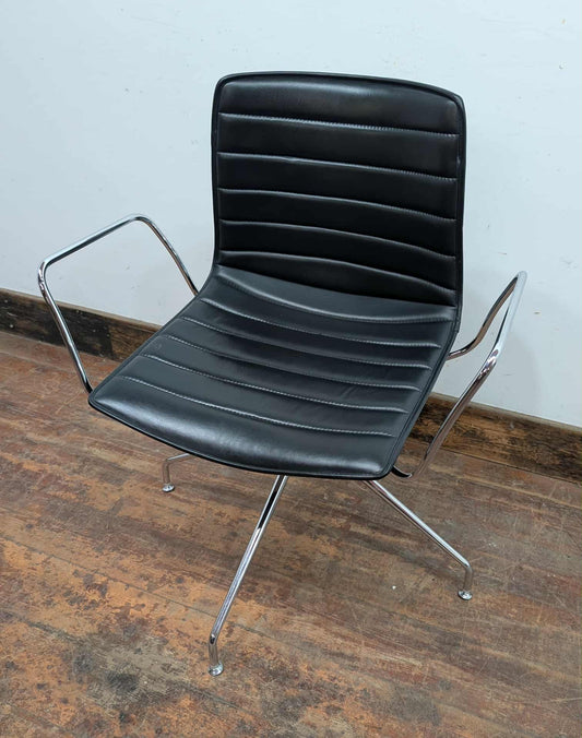 Set of 11 black faux leather swivel chairs with chrome frames