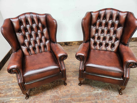 Two Chesterfield Armchairs in Oxblood Red Leather