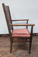 Brown Wooden Dining Armchair with Salmon-Pink Fabric Seat