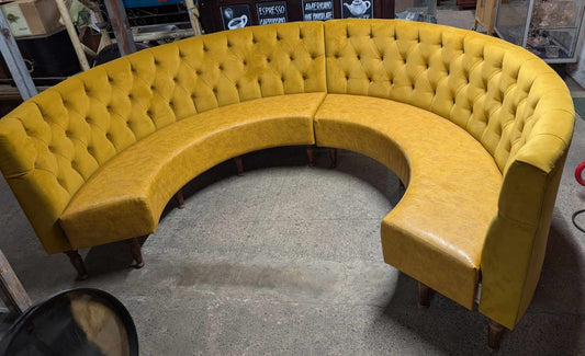 Large Circular Booth Seating in Mustard Yellow with Wooden Legs