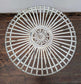 Metal Domed Patio Table and Two Chairs with Weathered Ornate Fence Design