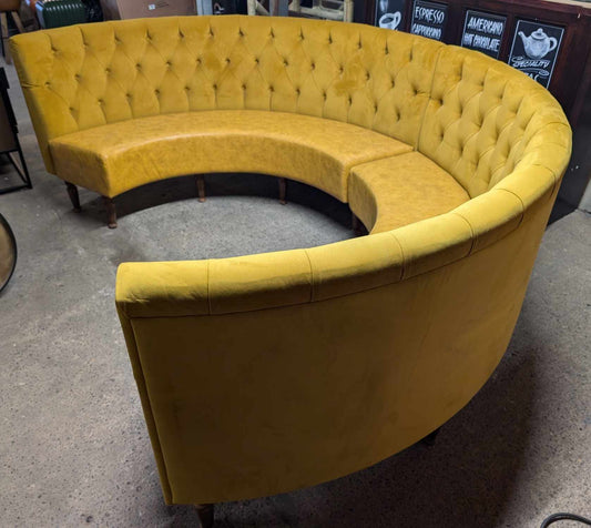 Large Circular Booth Seating in Mustard Yellow with Wooden Legs