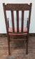 Brown Wooden Dining Armchair with Salmon-Pink Fabric Seat