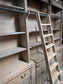 Huge Wooden Shelving Unit with Ladder and Rail, Drawers and Cabinets