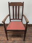 Brown Wooden Dining Armchair with Salmon-Pink Fabric Seat