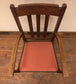 Brown Wooden Dining Armchair with Salmon-Pink Fabric Seat