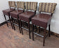 Set of Four Vegan Leather Bar Stools with Patterned Fabric Backs