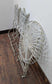 Metal Domed Patio Table and Two Chairs with Weathered Ornate Fence Design