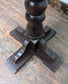 Medium Round Poseur Table with Decorative Column Base and Dark Wood Finish