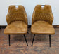 Pair of Tan Leather Dining Chairs with Black Steel Frames