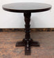 Medium Round Poseur Table with Decorative Column Base and Dark Wood Finish
