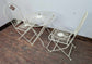 Metal Patio Table and Two Chairs with Simple Spoked Design