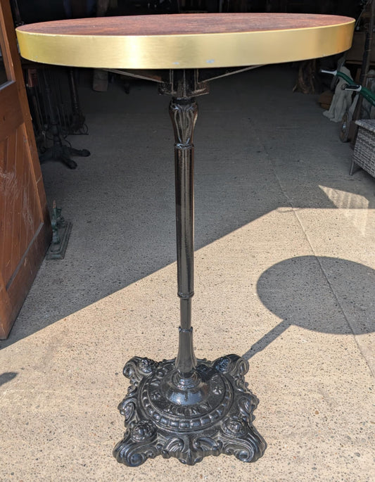 Brown and Gold Topped Poseur Table with Cast Iron Base