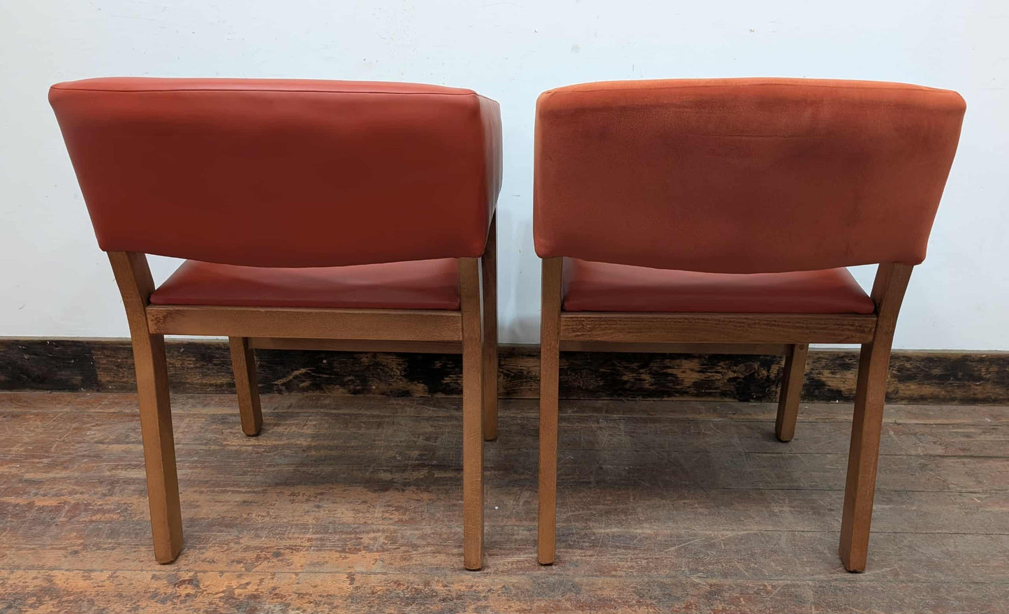 Set of 9 orange faux-leather and fabric tub chairs for cafe / pub / restaurant