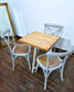 Set of Three White Bentwood Chairs and Triangular Base Wooden Table