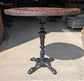 Carved Round Pub Table with Antique Wooden Top and Cast Iron Base
