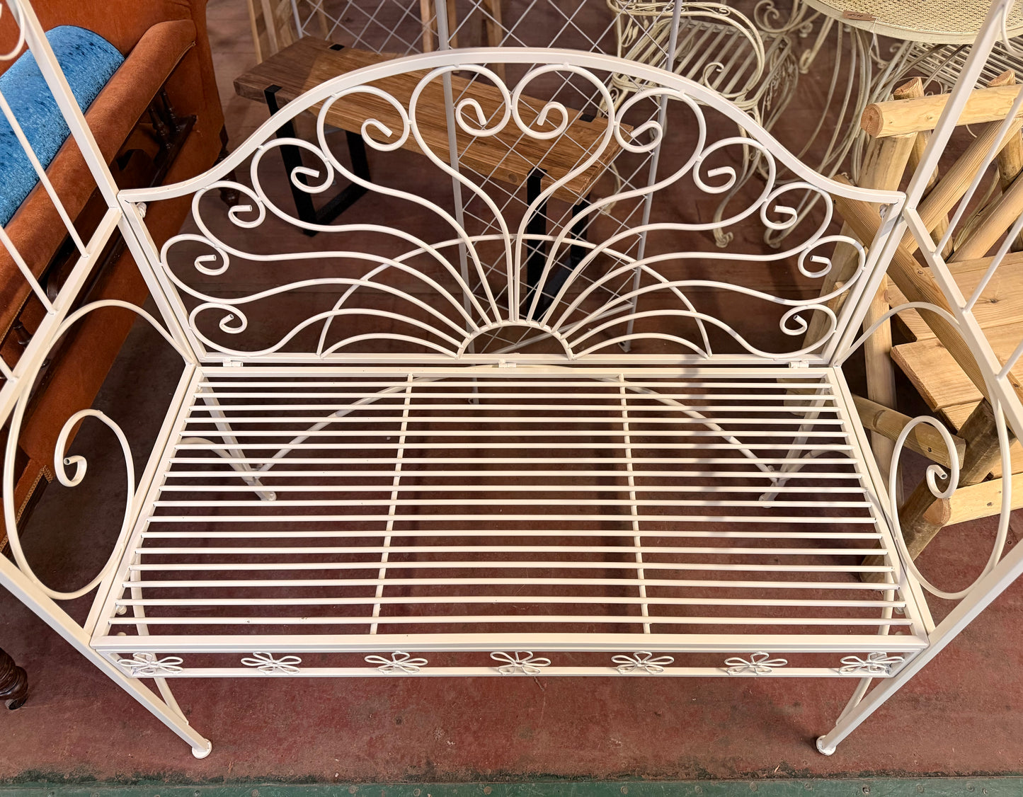 Beautiful white metal garden bench and arch