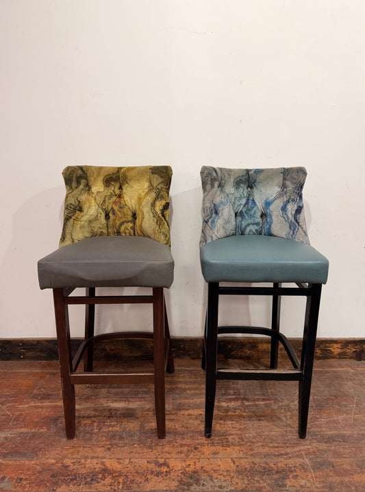 Pair of bar stools with marble effect fabric backs