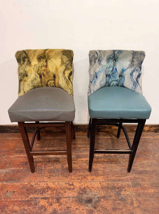 Pair of bar stools with marble effect fabric backs