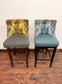 Pair of bar stools with marble effect fabric backs