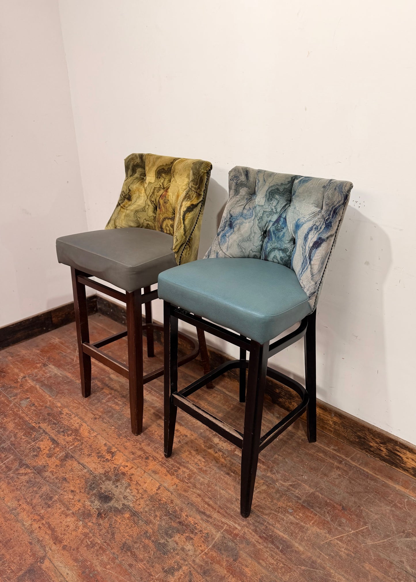 Pair of bar stools with marble effect fabric backs