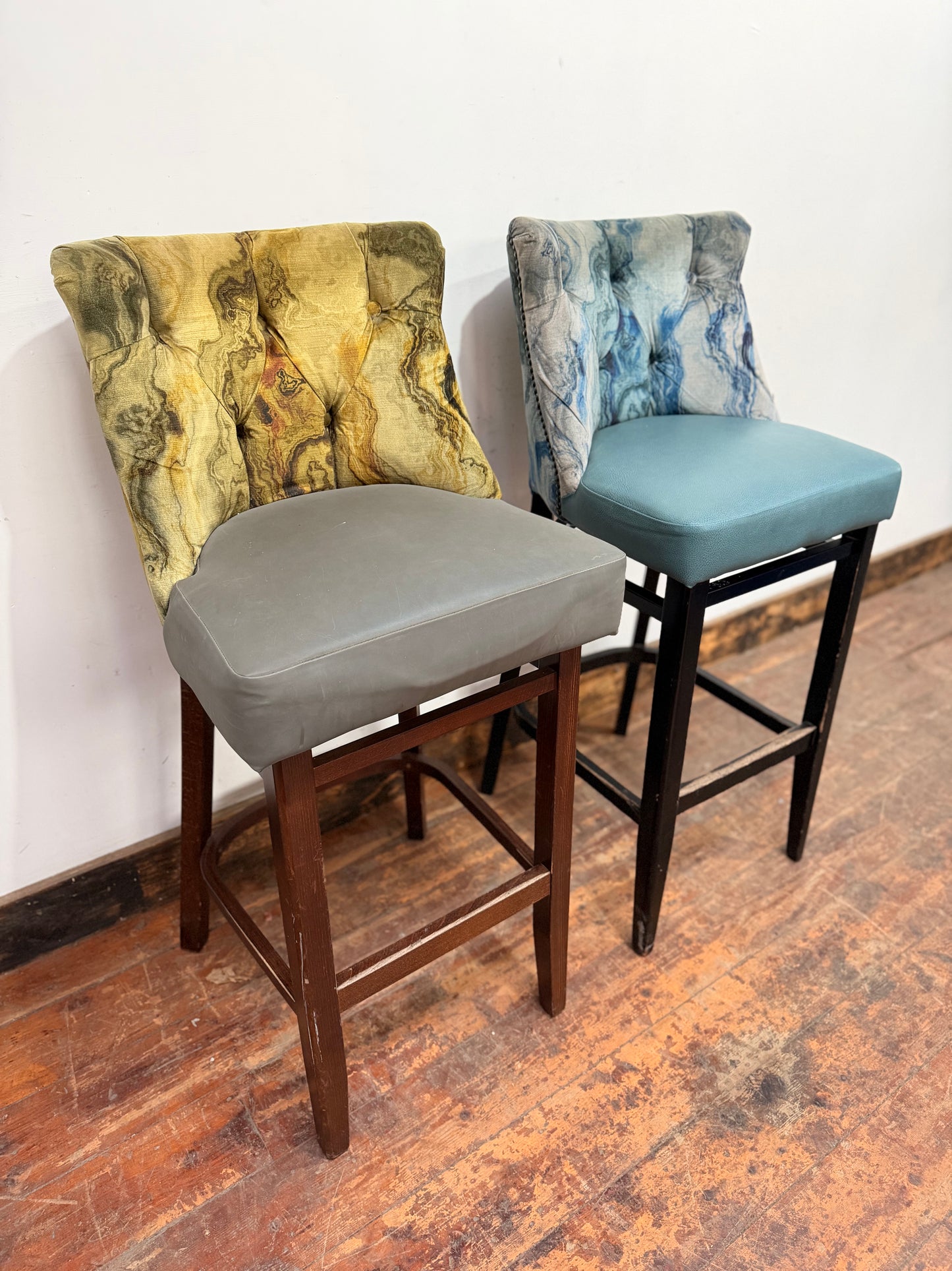Pair of bar stools with marble effect fabric backs
