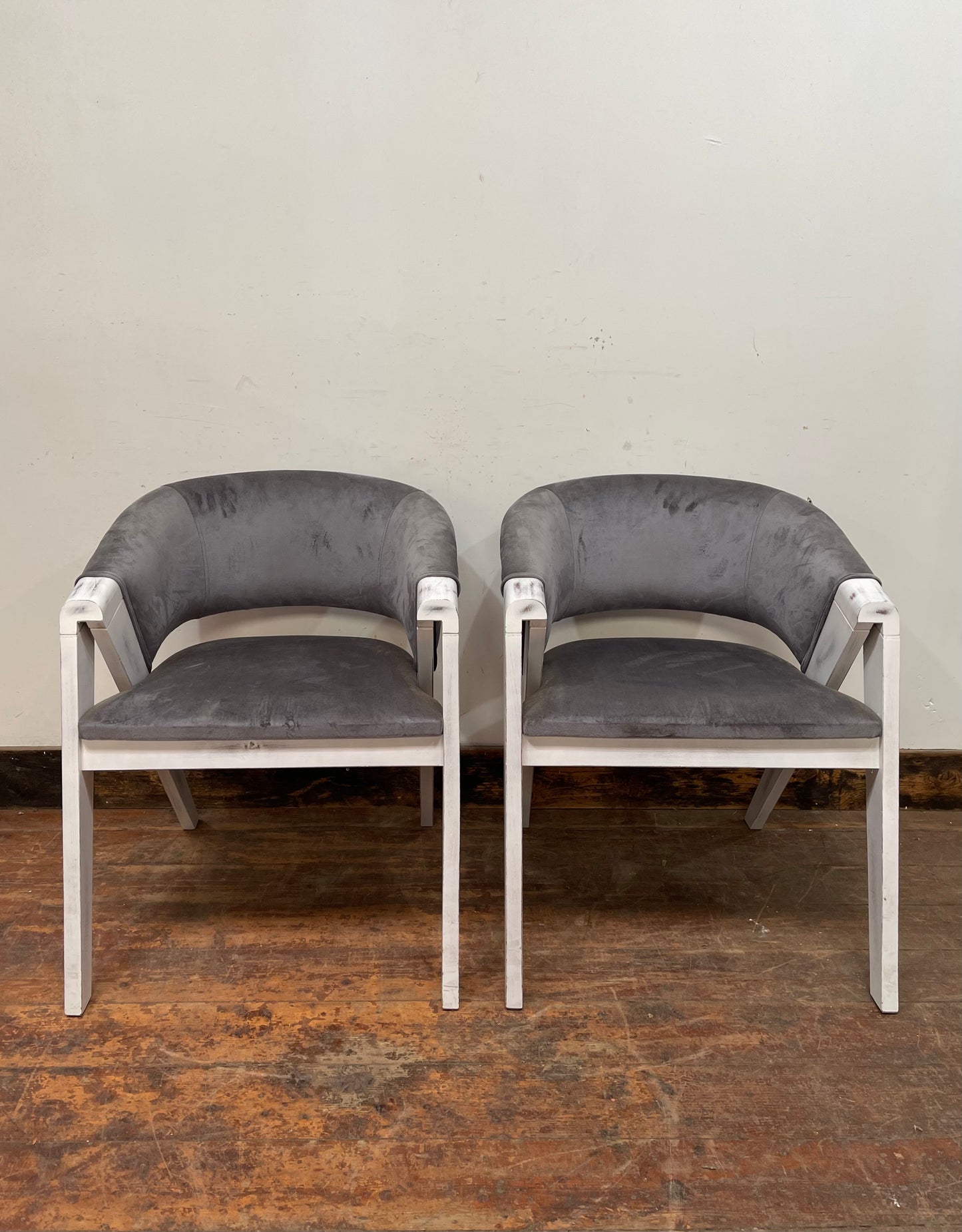 Pair of grey suede-feel chairs with white painted frames