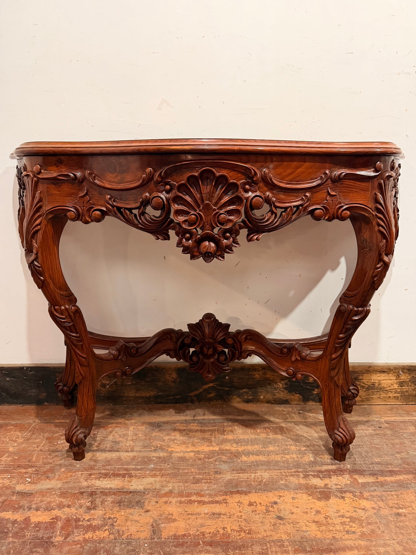 Vintage carved wooden hall table with flower detail