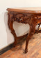 Vintage carved wooden hall table with flower detail