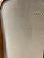 Pair of dining chairs with armrests and light fabric upholstery