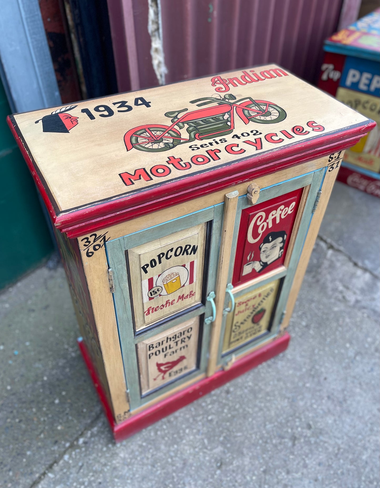 Quirky hand painted cabinet with retro / vintage style adverts