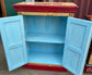 Quirky hand painted cabinet with retro / vintage style adverts