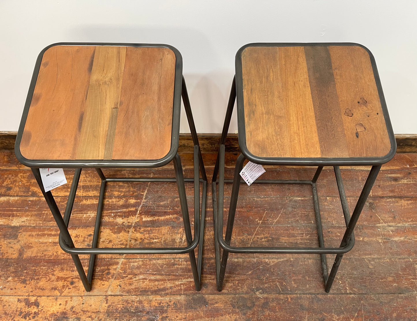 Industrial style bar stools with tilted seats