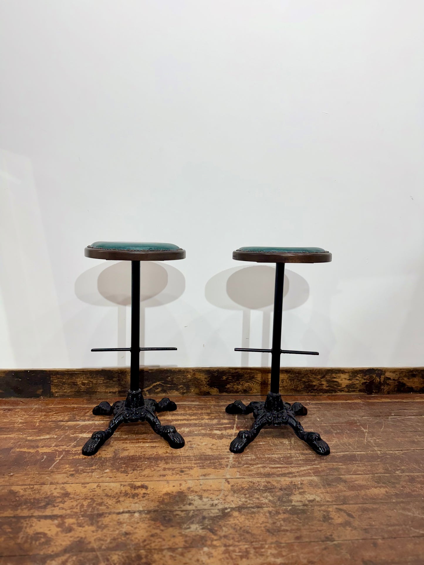 Pair of Turquoise Leather Bar Stools/Brass Stud Detail/Cast Iron Base
