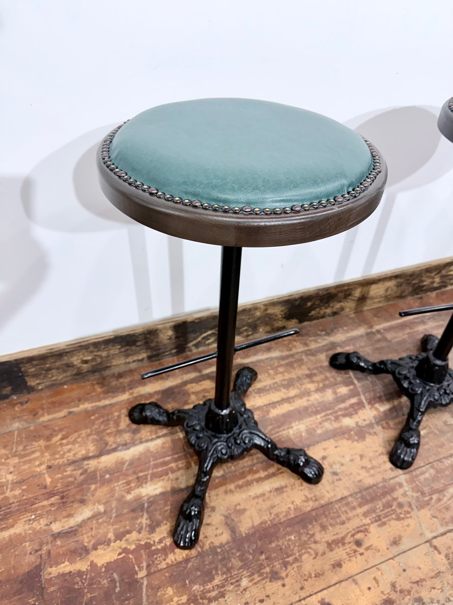 Pair of Turquoise Leather Bar Stools/Brass Stud Detail/Cast Iron Base