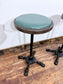 Pair of Turquoise Leather Bar Stools/Brass Stud Detail/Cast Iron Base
