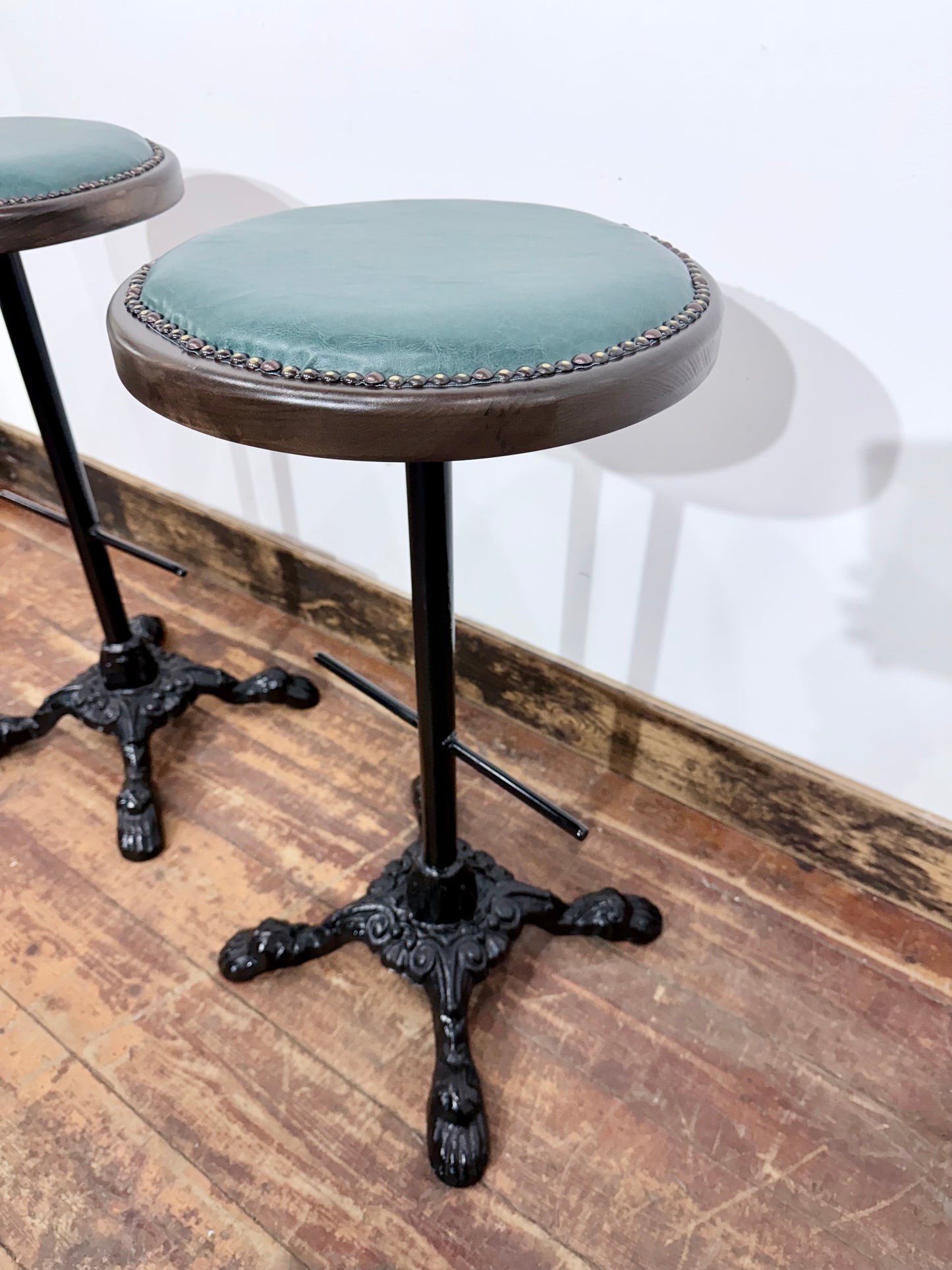 Pair of Turquoise Leather Bar Stools/Brass Stud Detail/Cast Iron Base
