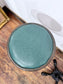 Pair of Turquoise Leather Bar Stools/Brass Stud Detail/Cast Iron Base