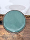 Pair of Turquoise Leather Bar Stools/Brass Stud Detail/Cast Iron Base