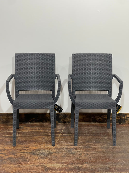 Pair of stackable outdoor pub / bar / cafe chairs in grey with armrests
