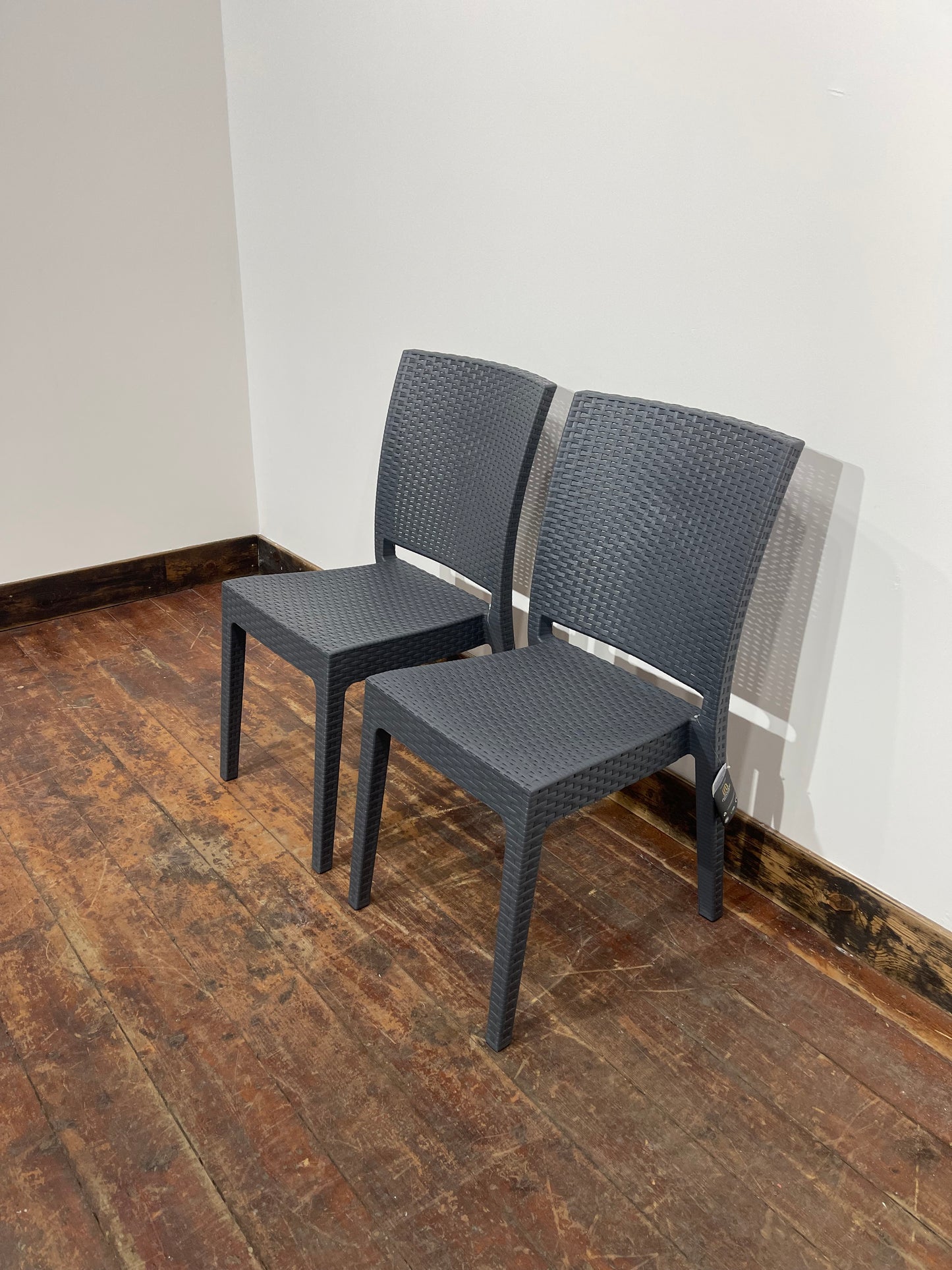 Pair of stackable outdoor pub / bar / cafe chairs in grey (no armrests)
