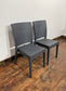 Pair of stackable outdoor pub / bar / cafe chairs in grey (no armrests)