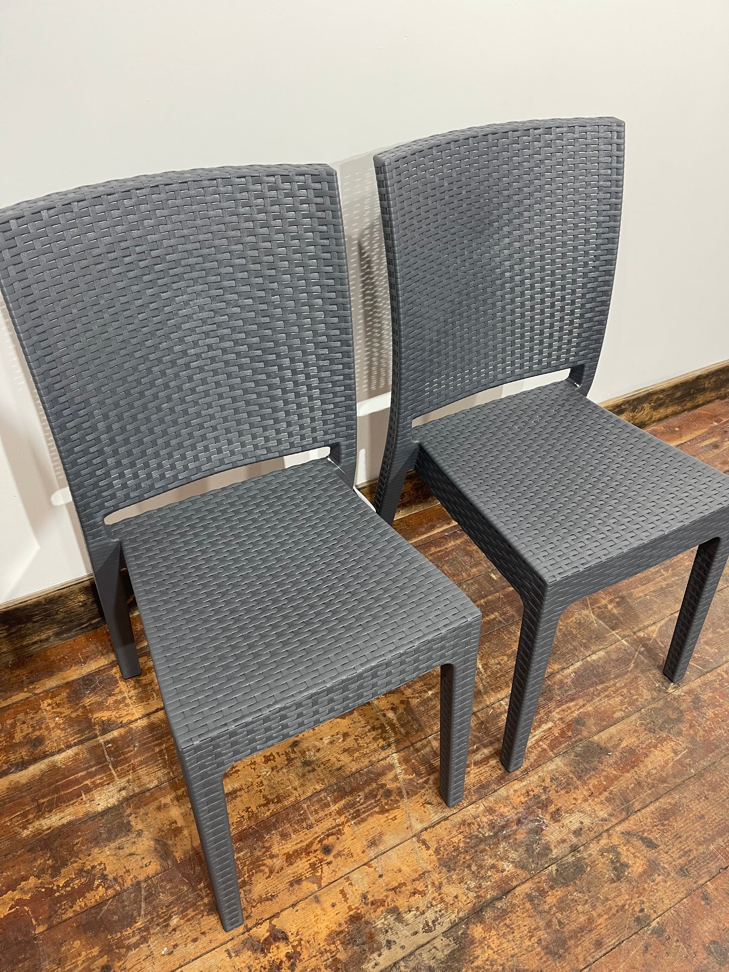 Pair of stackable outdoor pub / bar / cafe chairs in grey (no armrests)
