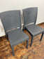 Pair of stackable outdoor pub / bar / cafe chairs in grey (no armrests)