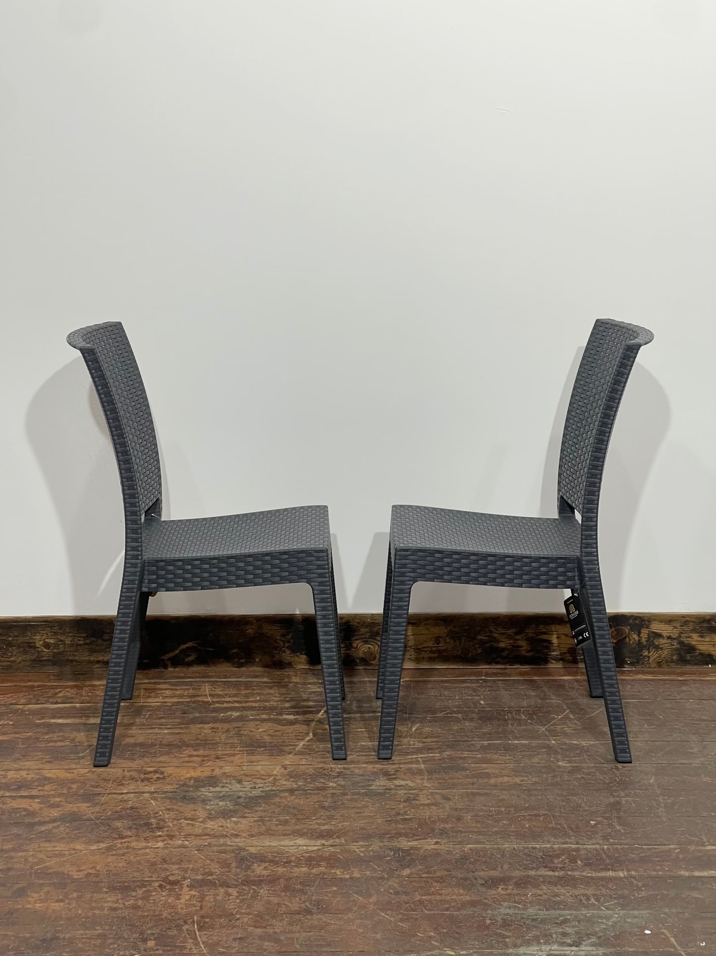 Pair of stackable outdoor pub / bar / cafe chairs in grey (no armrests)